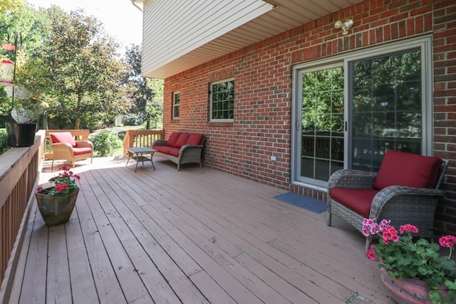 wooden deck with an outdoor hangout area