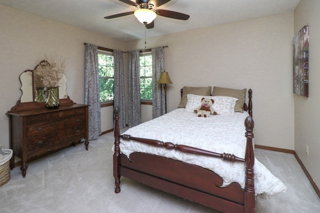 bedroom featuring carpet, ceiling fan, and baseboards