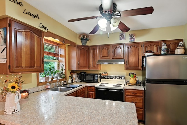 155 W Smiley Ave, Shelby, OH 44875 - kitchen featuring freestanding refrigerator, range with electric cooktop, under cabinet range hood, black microwave, and ceiling fan