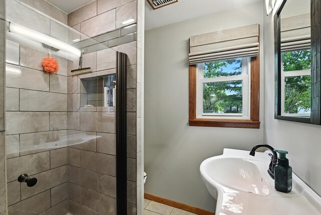 155 W Smiley Ave, Shelby, OH 44875 - full bath with healthy amount of natural light, a stall shower, and tile patterned flooring
