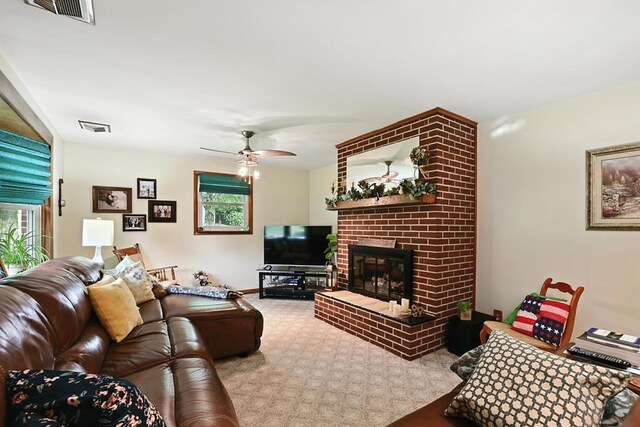 155 W Smiley Ave, Shelby, OH 44875 - living room featuring carpet flooring, a ceiling fan, and a brick fireplace