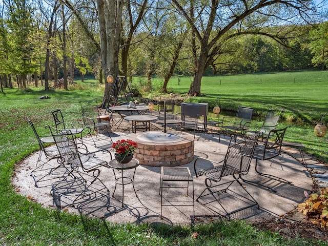 view of patio / terrace featuring a fire pit