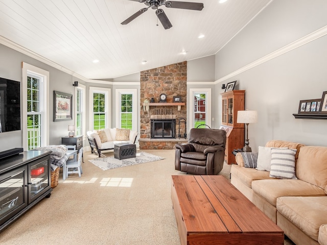 living room with ceiling fan, a stone fireplace, crown molding, vaulted ceiling, and wood ceiling