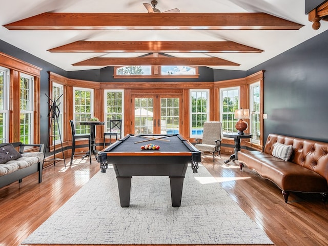 playroom with vaulted ceiling with beams, light hardwood / wood-style floors, billiards, and french doors