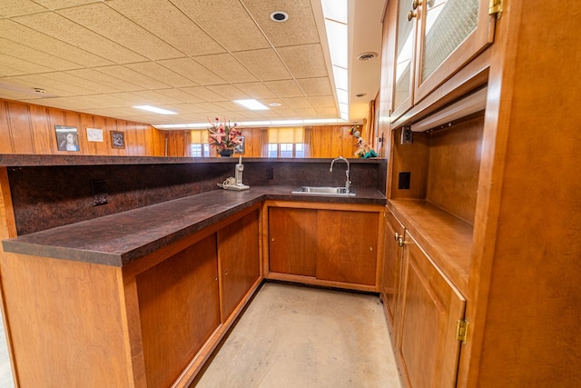 bar with sink and wood walls