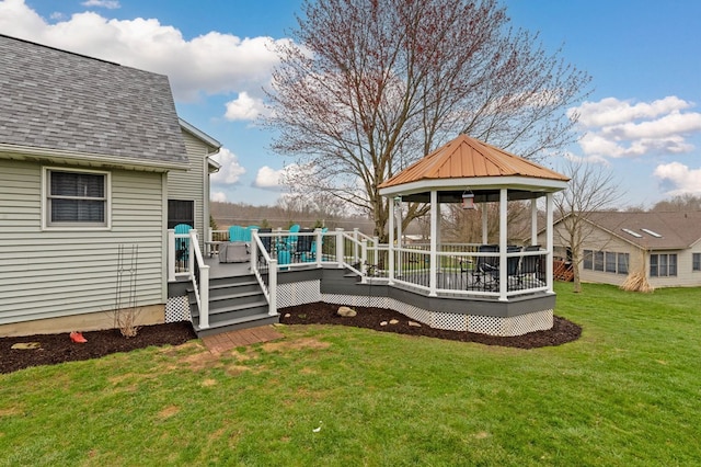 view of yard featuring a wooden deck and a gazebo
