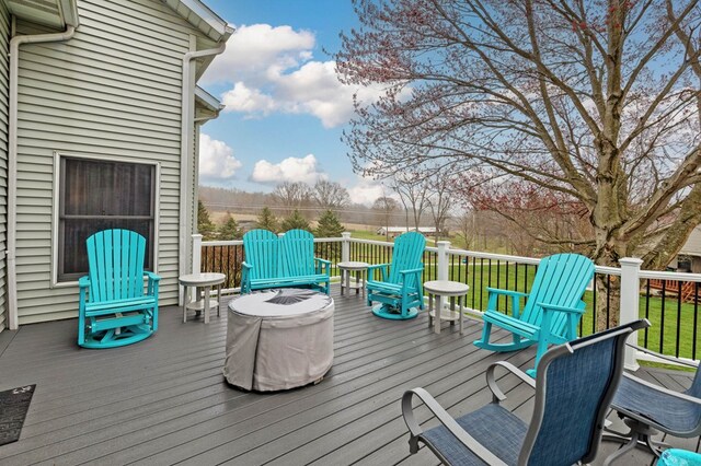 deck featuring a fire pit
