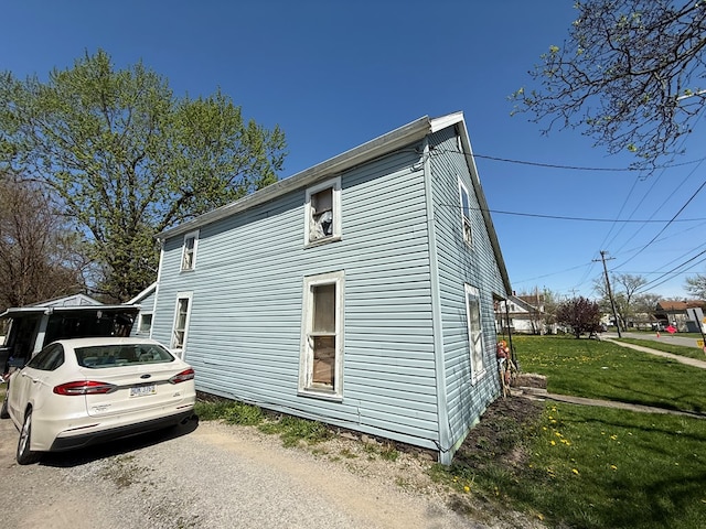 813 N Cole St, Lima, OH 44805 - view of property exterior with a lawn