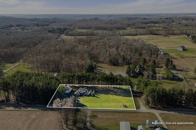 birds eye view of property featuring a rural view