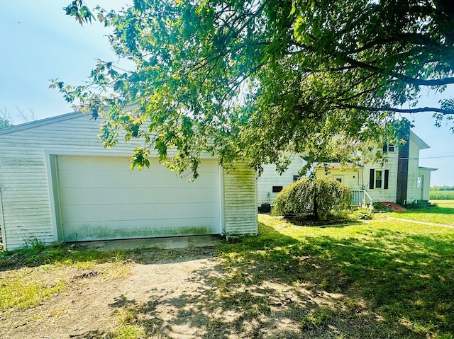 view of property exterior with a yard