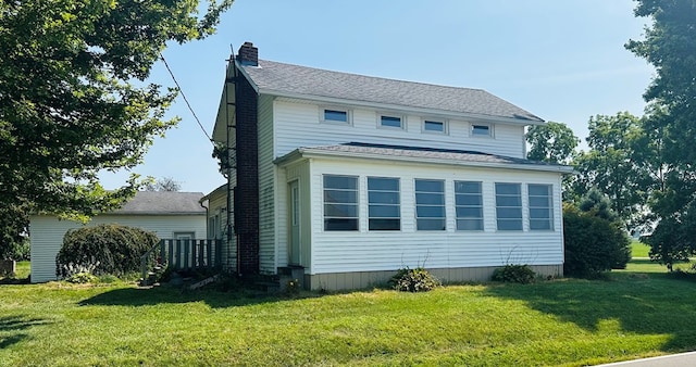 exterior space featuring a lawn