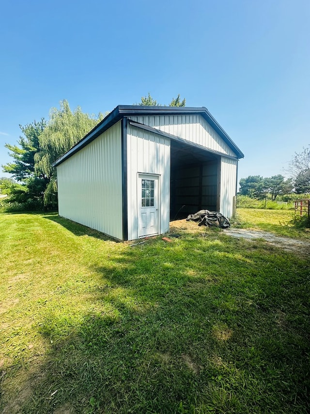 view of outbuilding with a lawn