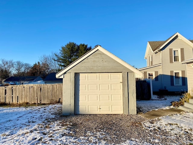 view of snow covered garage