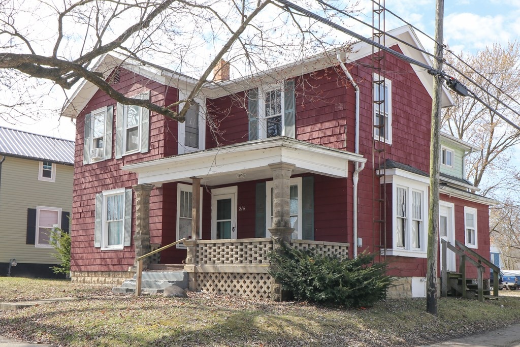 214 Park St, Willard, OH 44890 - view of front of home with a porch and entry steps