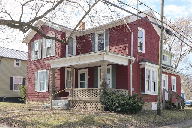214 Park St, Willard, OH 44890 - view of front of home with a porch and entry steps