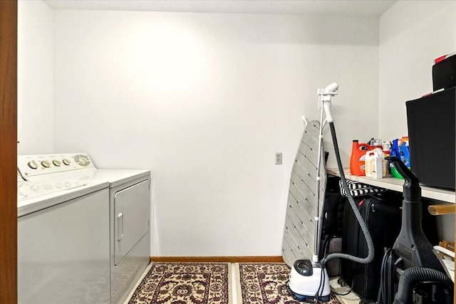 415 Lakeshore Rd, Ashland, OH 44805 - laundry room with washer and clothes dryer and baseboards