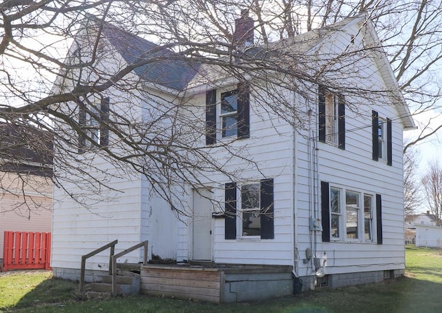 58 E Whitney Ave, Shelby, OH 44875 - view of front of house featuring a chimney