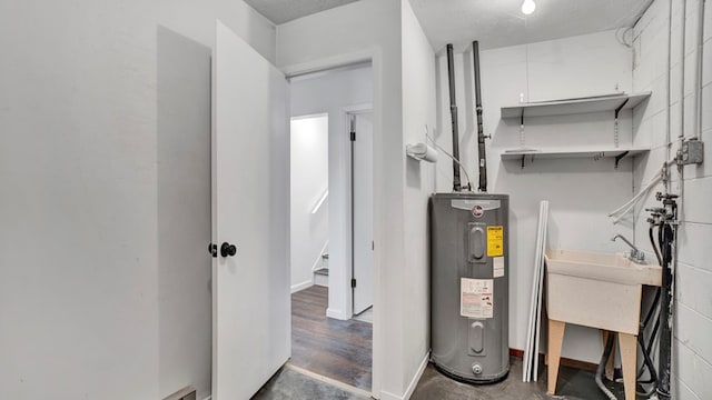 utility room featuring electric water heater