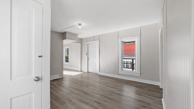 spare room with hardwood / wood-style flooring