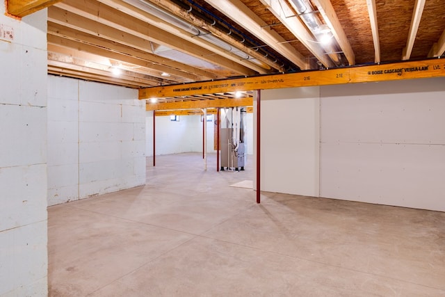 basement featuring heating unit