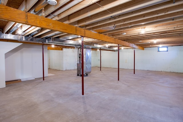 basement featuring heating unit