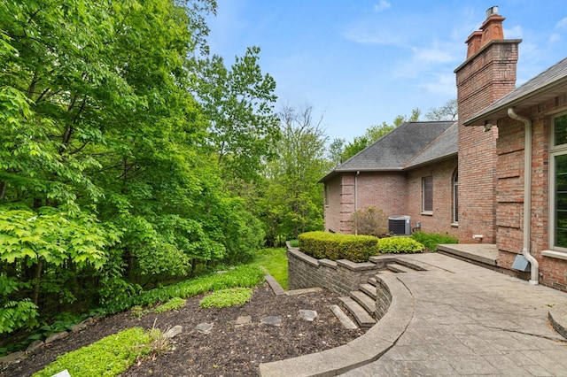 640 Running Brook Way, Mansfield, OH 44903 - view of yard featuring central AC unit and a patio area