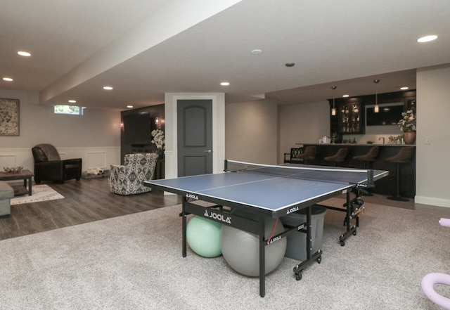 122 Woodside Blvd, Lexington, OH 44904 - playroom featuring bar with sink, recessed lighting, wood finished floors, and carpet floors