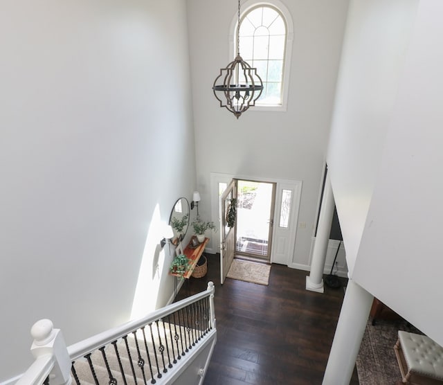 122 Woodside Blvd, Lexington, OH 44904 - entrance foyer featuring plenty of natural light, a chandelier, dark wood-type flooring, and a towering ceiling