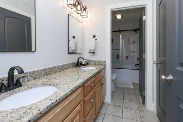 122 Woodside Blvd, Lexington, OH 44904 - full bath with toilet, double vanity, tile patterned floors, and bath / shower combo with glass door