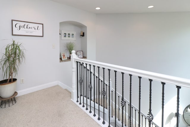 122 Woodside Blvd, Lexington, OH 44904 - corridor with an upstairs landing, recessed lighting, baseboards, carpet, and arched walkways