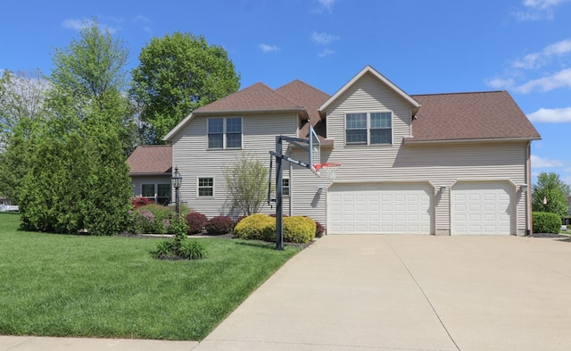 122 Woodside Blvd, Lexington, OH 44904 - view of front of home with concrete driveway, a front yard, and roof with shingles