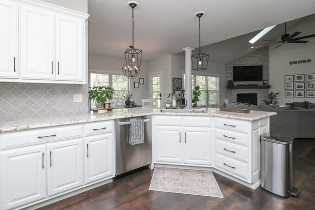 122 Woodside Blvd, Lexington, OH 44904 - kitchen featuring stainless steel dishwasher, a ceiling fan, vaulted ceiling, decorative backsplash, and healthy amount of natural light