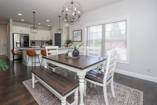 122 Woodside Blvd, Lexington, OH 44904 - dining room featuring healthy amount of natural light, dark wood-style floors, baseboards, and recessed lighting