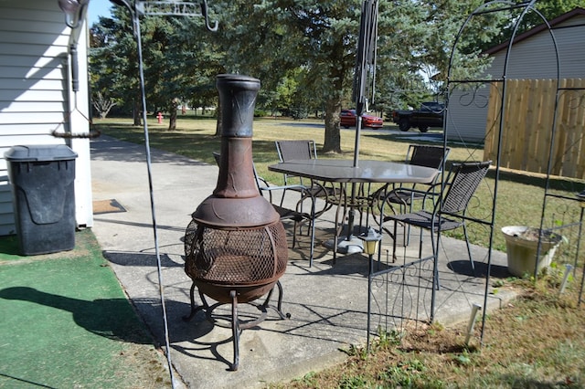 view of patio featuring an outdoor fire pit