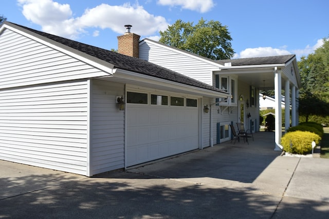 view of home's exterior with a garage