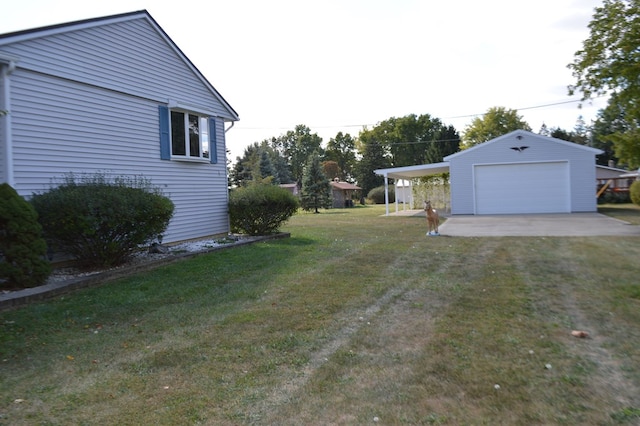 view of yard with an outbuilding, a carport, and a garage