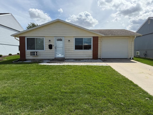 1421 Cullen Ave, Bucyrus, OH 44820 - view of front of property with brick siding, a garage, entry steps, driveway, and a front lawn