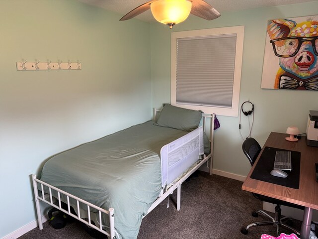1421 Cullen Ave, Bucyrus, OH 44820 - carpeted bedroom with a ceiling fan and baseboards