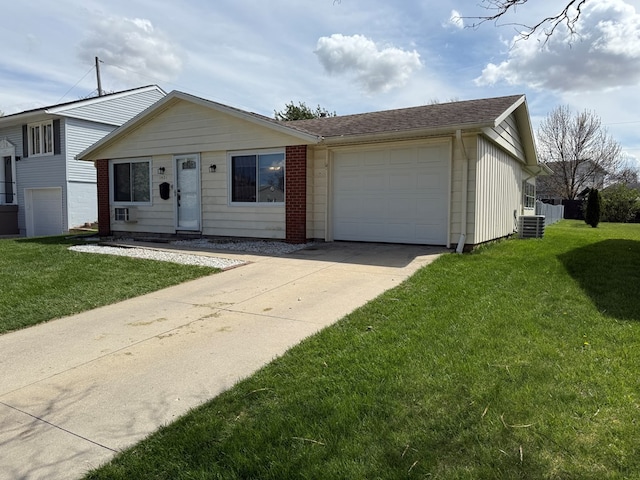 1421 Cullen Ave, Bucyrus, OH 44820 - view of front of house featuring brick siding, central air condition unit, a garage, driveway, and a front lawn