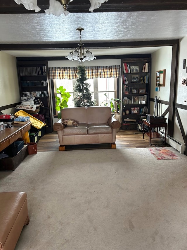 carpeted living room with a notable chandelier