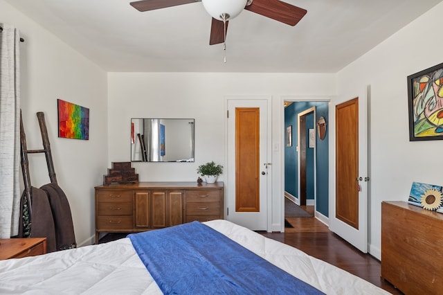 bedroom featuring ceiling fan and dark wood-type flooring