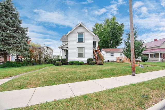 view of front of home featuring a front yard