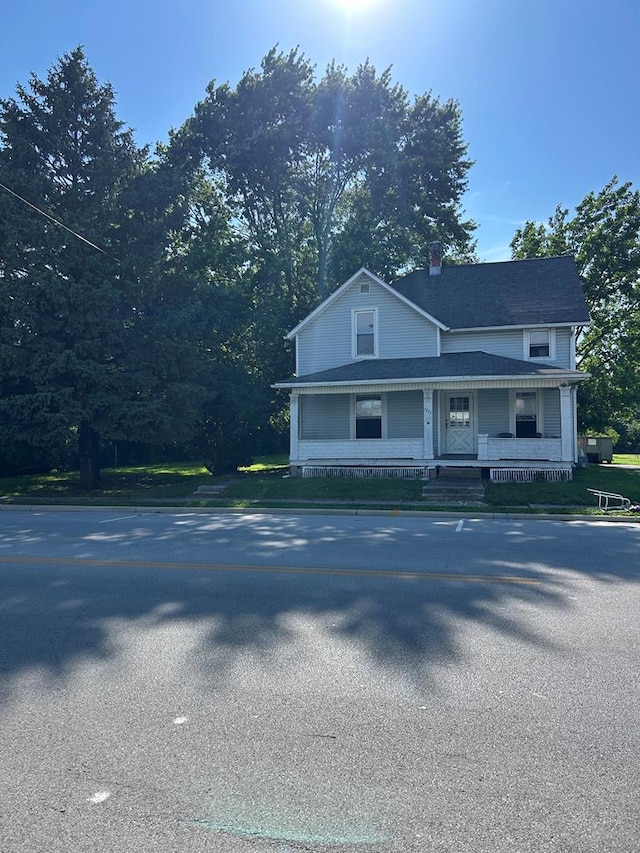 1221 N Sandusky Ave, Bucyrus, OH 44820 - view of front of house featuring a porch