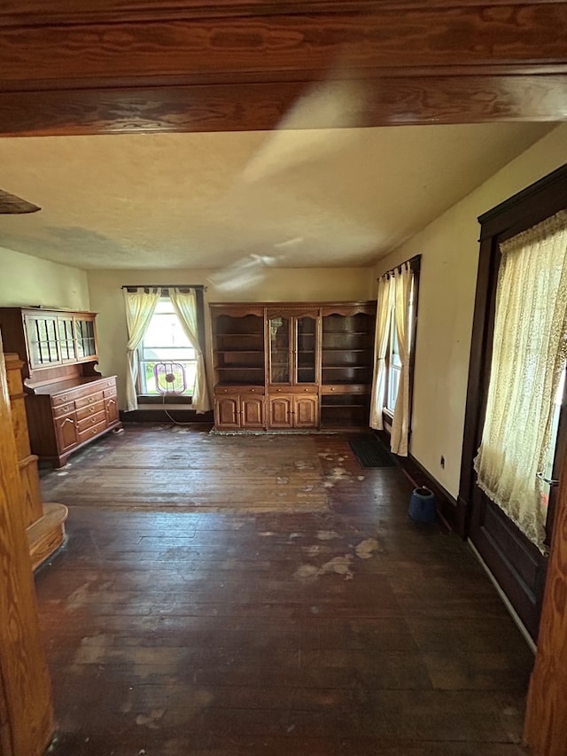 1221 N Sandusky Ave, Bucyrus, OH 44820 - unfurnished living room featuring dark wood finished floors