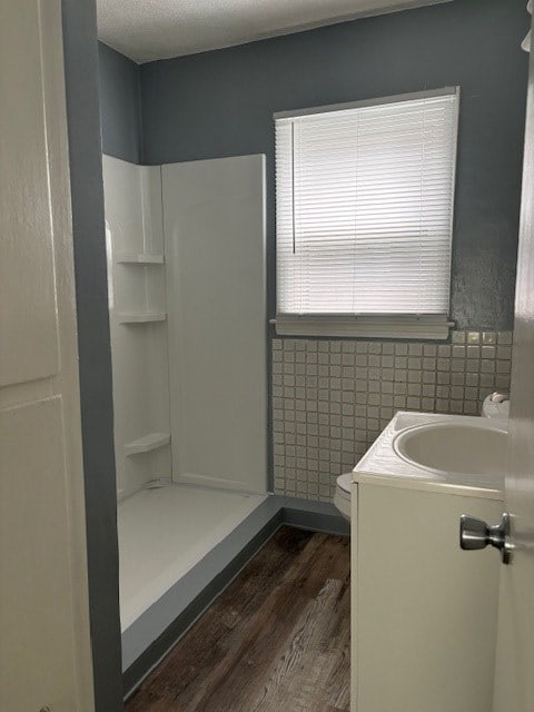 434 Michigan Ave, Mansfield, OH 44905 - full bath featuring wood finished floors, a stall shower, and vanity