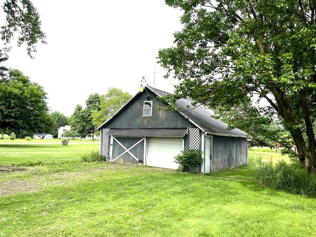 5655 Lime Rd, Galion, OH 44833 - view of barn with a lawn
