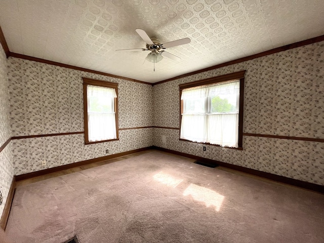 5655 Lime Rd, Galion, OH 44833 - carpeted empty room featuring crown molding, ceiling fan, and wallpapered walls