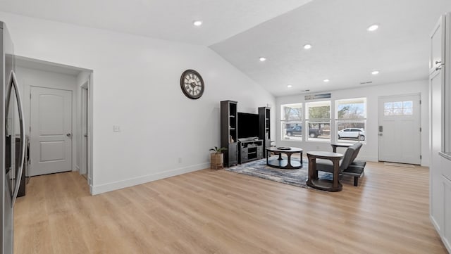 living room with lofted ceiling, light wood-style floors, baseboards, and recessed lighting