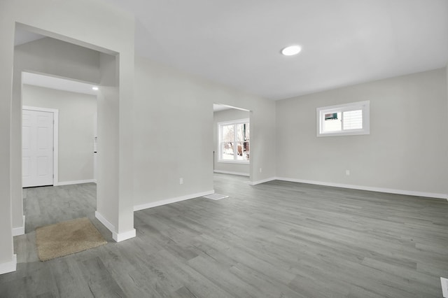 spare room with light hardwood / wood-style flooring