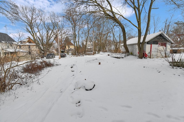 view of yard covered in snow